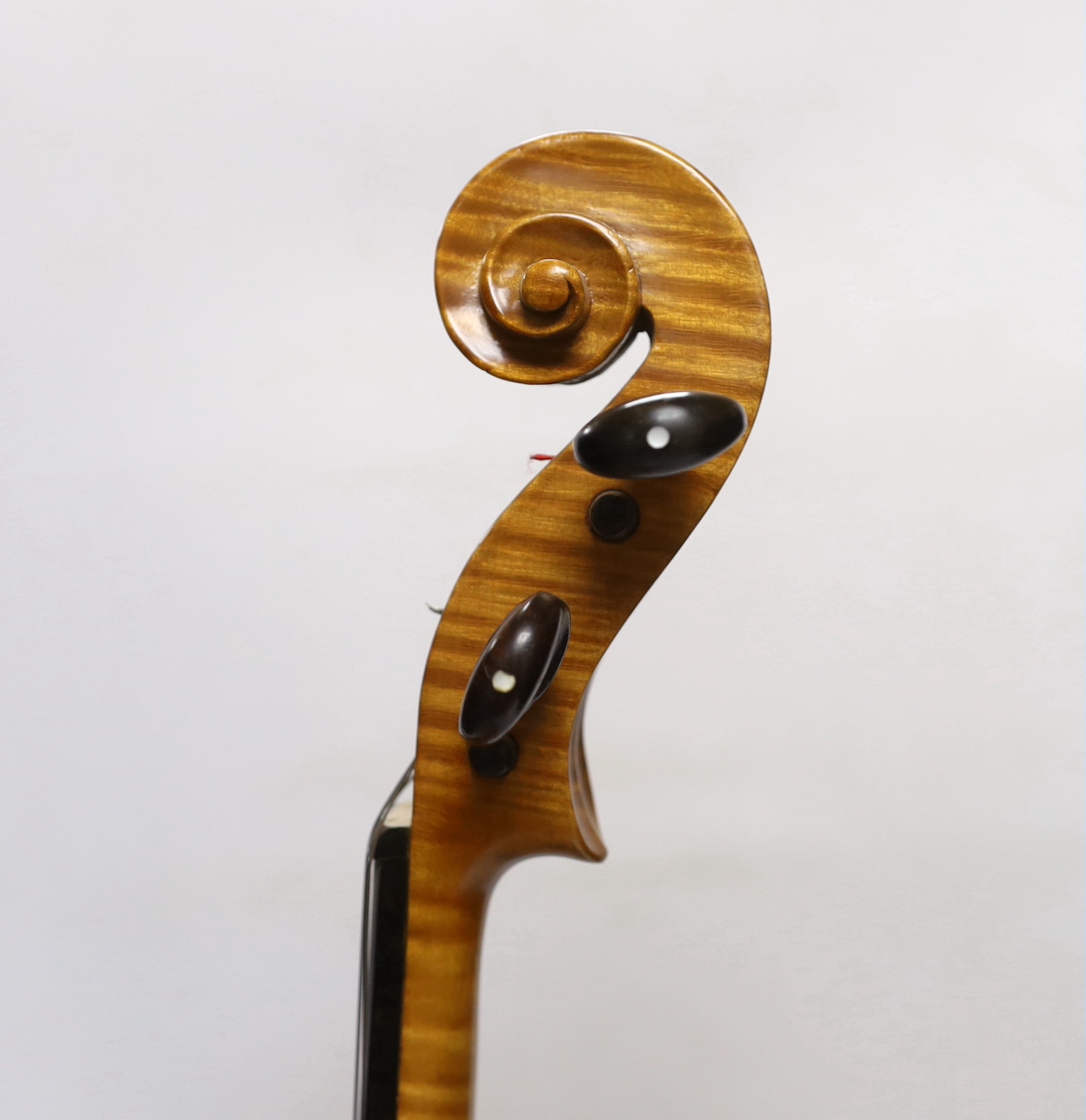 A bird's eye maple veneered student's violin, 58.5cm long